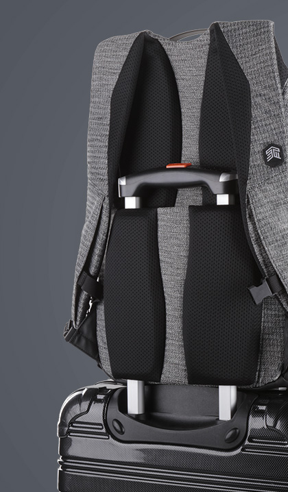 Myth 18L bag, slung over a suitcase handle