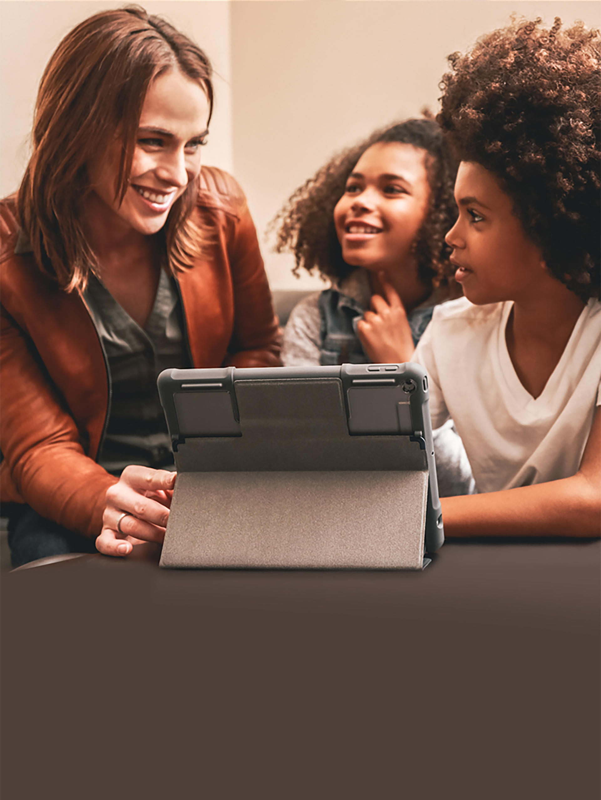 Adult with two children and laptop